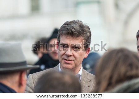 PARIS, FRANCE - APRIL 6: French Minister for Industrial Renewal Arnaud Montebourg supports made in France and talks to the employees of the company Blanc de Vosges at Montmartre. Paris, April 6, 2013
