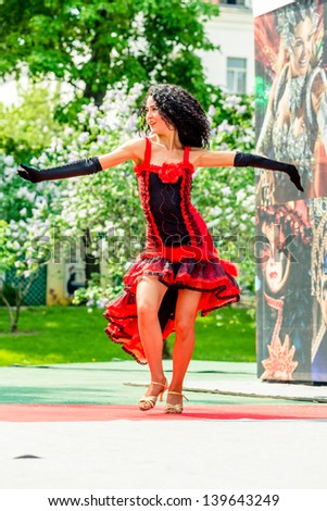 MOSCOW, RUSSIA - 18 MAY: Participants of annual carnival in Moscow in Ermitage Garden - woman dancing flamenco. Moscow, 18 may, 2013