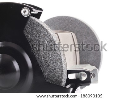 Closeup of bench grinder isolated on white background
