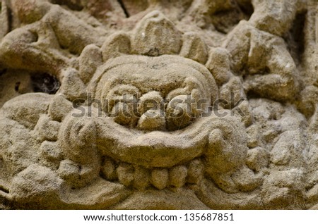 Demon statue carving in Angkor