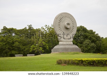 The Wheel of Law in Buddhism made of stone