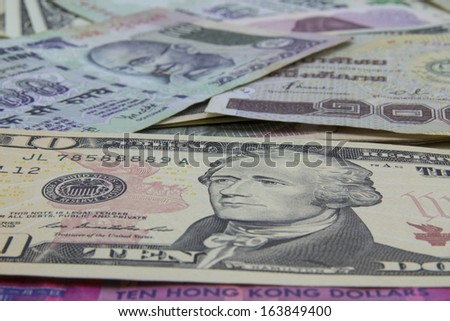 Mixed currency banknotes background