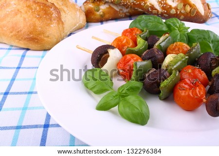 Vegetarian grilled with brown mushrooms, cherry tomatoes and basil
