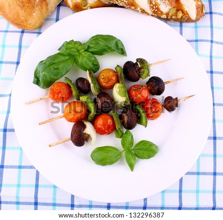 Vegetarian grilled with brown mushrooms, cherry tomatoes, top view