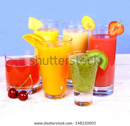 Fruit juices from kiwi, cherry, orange, strawberry, banana, pineapple, vertical