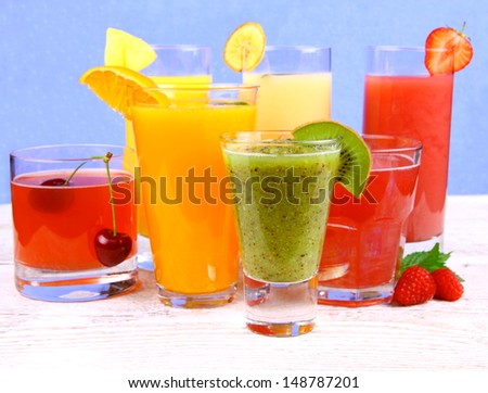 Fruit juices, kiwi, raspberries, cherry, orange, strawberry, pineapple, close up