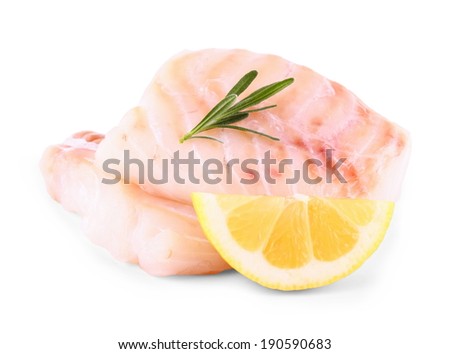 Cod fish fillet with lemon, rosemary on white, isolated