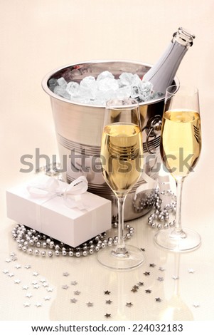 Two champagne glasses, gift, ice, cooler as delicate edition