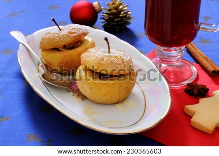 Baked apples as Christmas dessert and mulled wine, horizontal