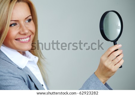 Looking Through Glass. woman looking through a