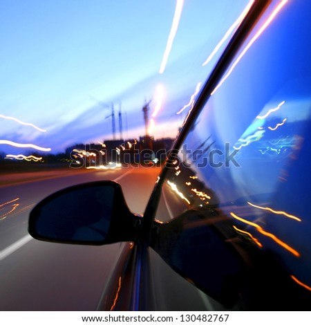 speed drive on car at night motion blurred