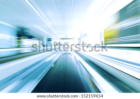 Blurred backround of moving futuristic escalator Blurred backround of moving futuristic escalator