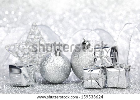 Beautiful shiny Christmas decoration on silver background