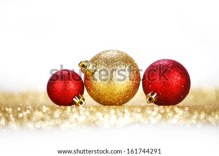 Colorful christmas balls on glitter background