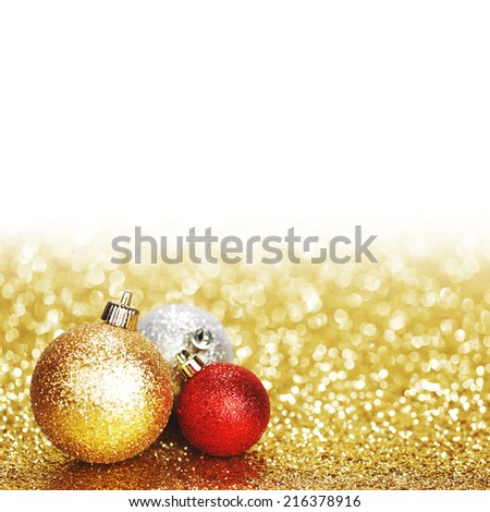 Beautiful Glitter christmas balls close-up on shining background