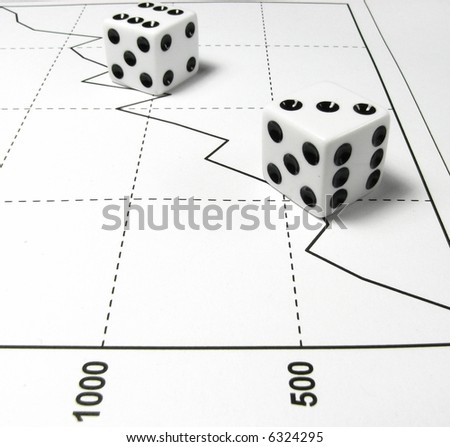 A close up on a pair of white dice over a line graph of increasing trend.
