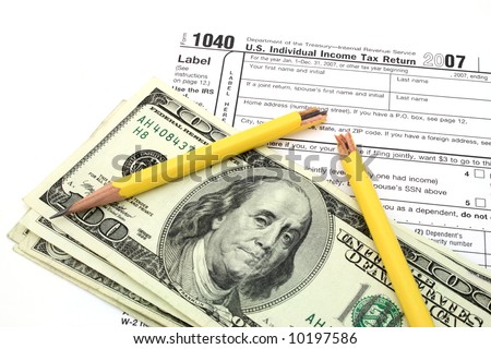 broken yellow pencil over dollars and 1040 tax form