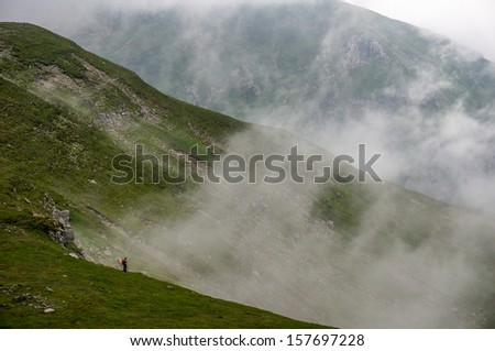 Man alone in the mountains