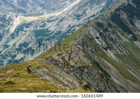 Man alone on a beautiful mountain ridge, Romania.