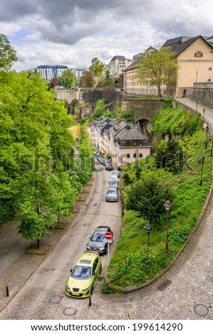 LUXEMBOURG CITY, LUXEMBOURG, April 27, 2014. Cars lined up alongside the houses on a steep road in Luxembourg