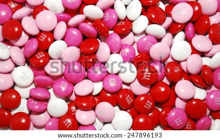 HAGERSTOWN, MD - JANUARY 25, 2015:  Image of m&m candies.  M&Ms are made by Mars, Incorporated and were first introduced in 1941.