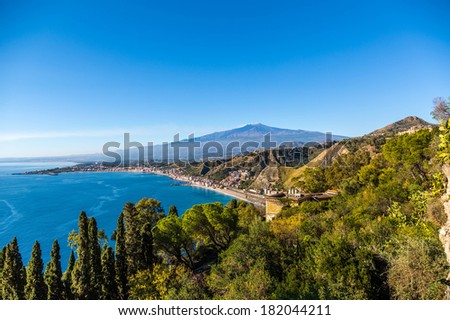 Taormina\'s cost line, the bay of Giardini-Naxos with the Etna and Catania in the background, Taormina, Sicily - HDR picture