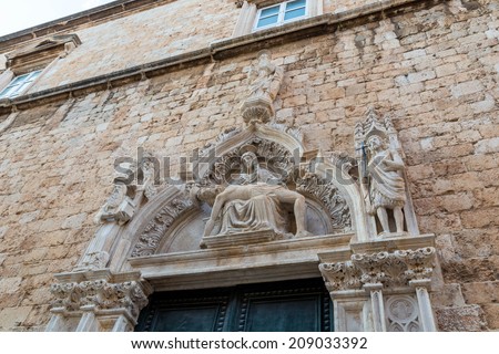 A Pieta on the front core of the Franciscan Cloister in Ragusa, Dubrovnik, Croatia
