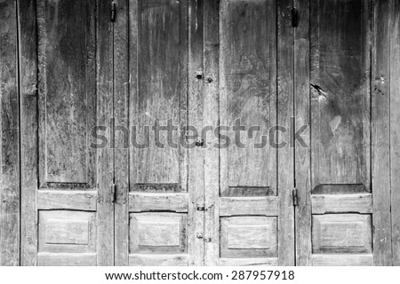 old black-white door