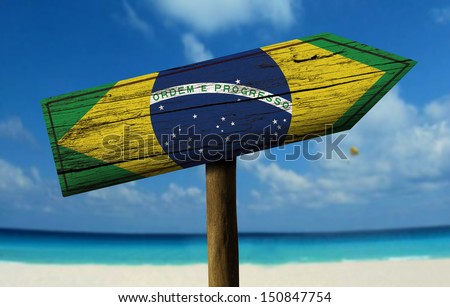 Brazil Flag Wooden Sign With A Beach On Background - Latin America