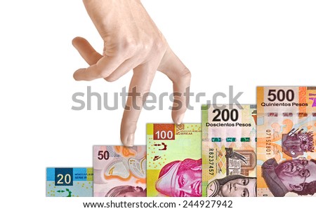 Hand climbing a Mexican peso bill mountain Hand climbing a Mexican peso bill mountain