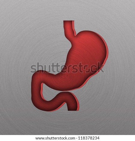Stomach, stamped into polished  metal. Medical concept