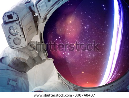 Astronaut in outer space. Elements of this image furnished by NASA.