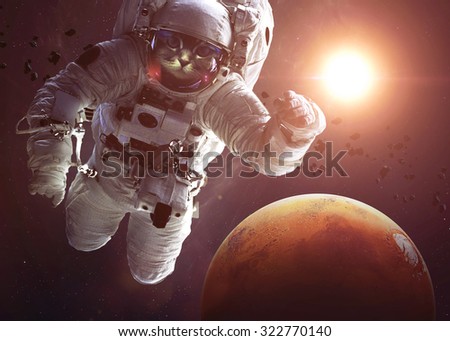 Beautiful cat in outer space with Mars. Elements of this image furnished by NASA.