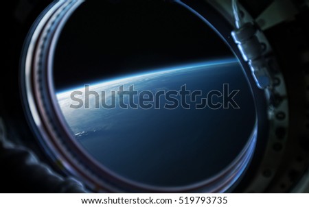 Earth planet in space ship window porthole. Elements of this image furnished by NASA