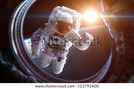 Earth planet and astronaut in space ship window porthole. Elements of this image furnished by NASA