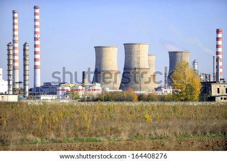 Industrial view with a petrochemical plant and its cooling towers