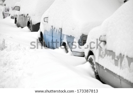 Snow covered cars after heavy snowfall