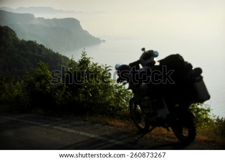 Adventure motorcycle silhouette on the Black Sea coastline in Turkey