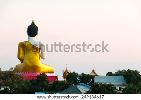 Buddha statue Sit back turned on whith background