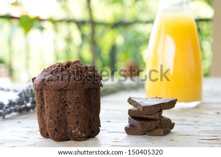 Chocolate muffin with orange juice