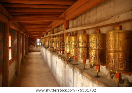 Golden Buddhist prayer wheels, Tibet