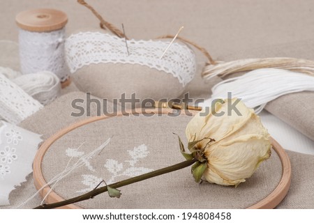 Sewing And Embroidery Craft Kit. Dried Rose. Natural Linen Background
