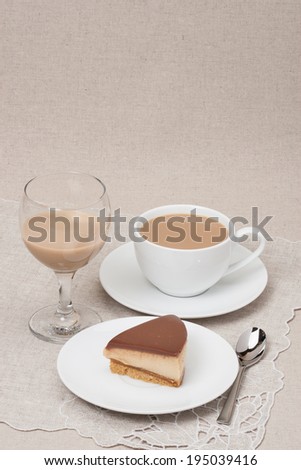 Chocolate And Toffee Cheese Cake. Irish Cream Or Coffee Liquor. Natural Linen Background.