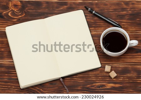 Blank Open Notepad. Cup Of Coffee. Wooden Background.