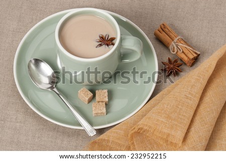 Cup Of Coffee, Cocoa or Tea With Milk And Spices. Old Silver Spoon. Natural Linen Table Cloth.