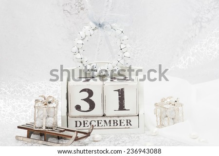 New Year Date On Calendar. December 31. Christmas Decorations. Gift Box On Sleigh. Sweets.