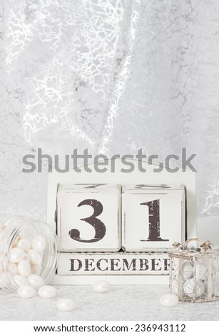 New Year Date On Calendar. December 31. Christmas Decorations. Gift Boxes With Sweets.