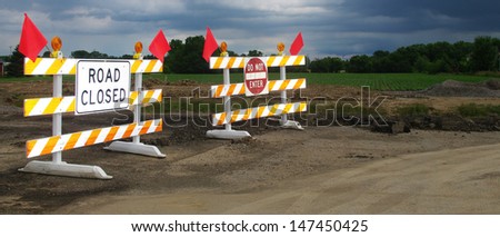 Transportation concept: red and white warning flags colors fenced protected area