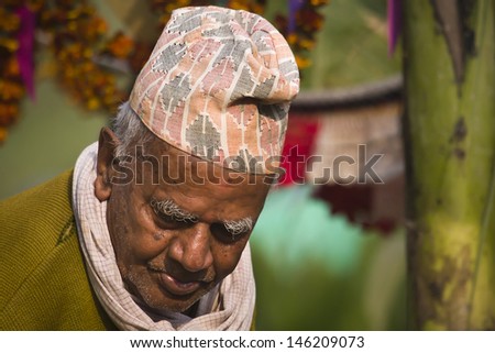 THAKURDWARA, NEPAL - FEBRUARY 06  Unidentified Tharu old man portrait on february 6, 2010 in Thakurdwara village, Bardia district, Nepal. Tharu are an ethnic group from west part of Nepal,