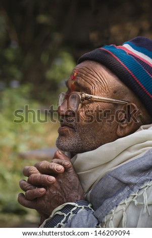 THAKURDWARA, NEPAL - FEBRUARY 06  Unidentified Tharu man portrait on february 6, 2010 in Thakurdwara village, Bardia district, Nepal. Tharu are an ethnic group from west part of Nepal,